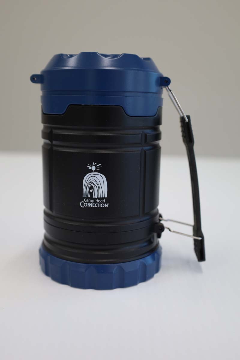 photo of lantern with white chc logo closed