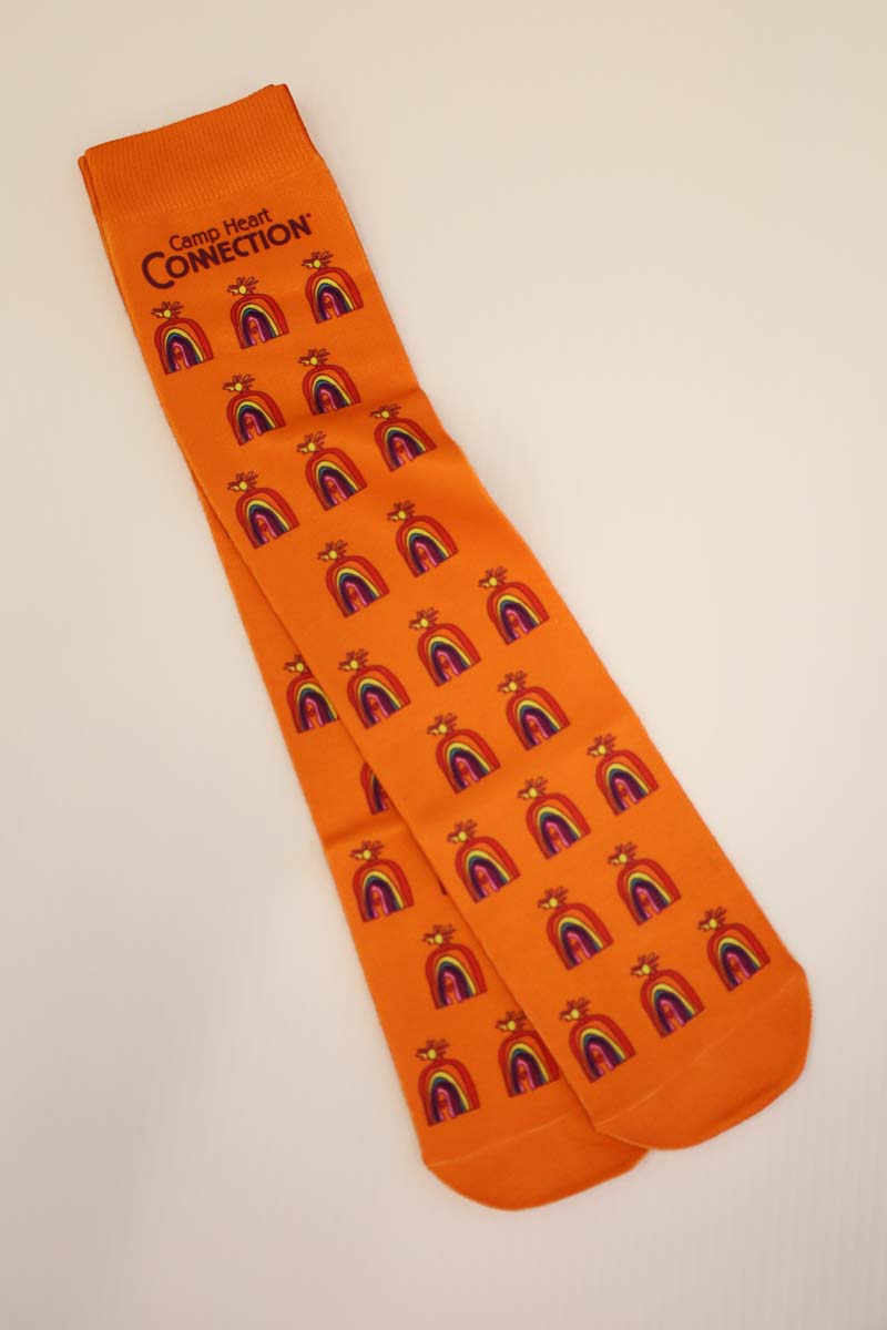 photo of orange socks with full color chc logo scattered