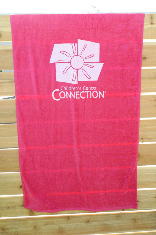 photo of hot pink towel with white ccc logo